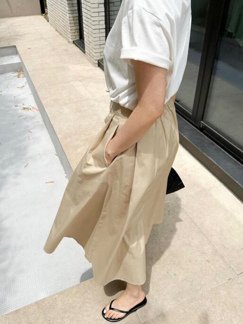 BACK BANDED FLARED PLEAT SKIRT