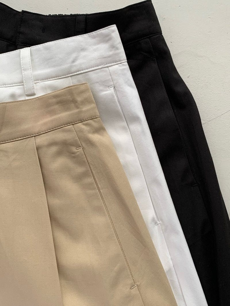 BACK BANDED FLARED PLEAT SKIRT