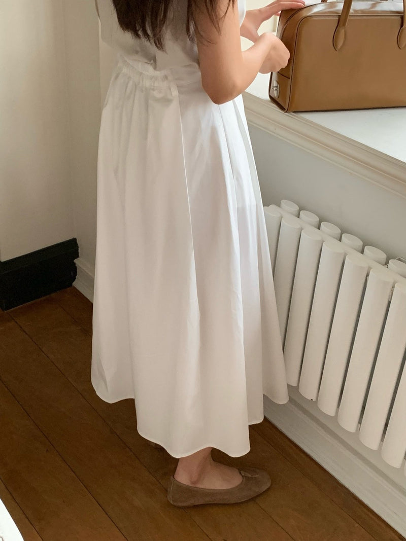 BACK BANDED FLARED PLEAT SKIRT