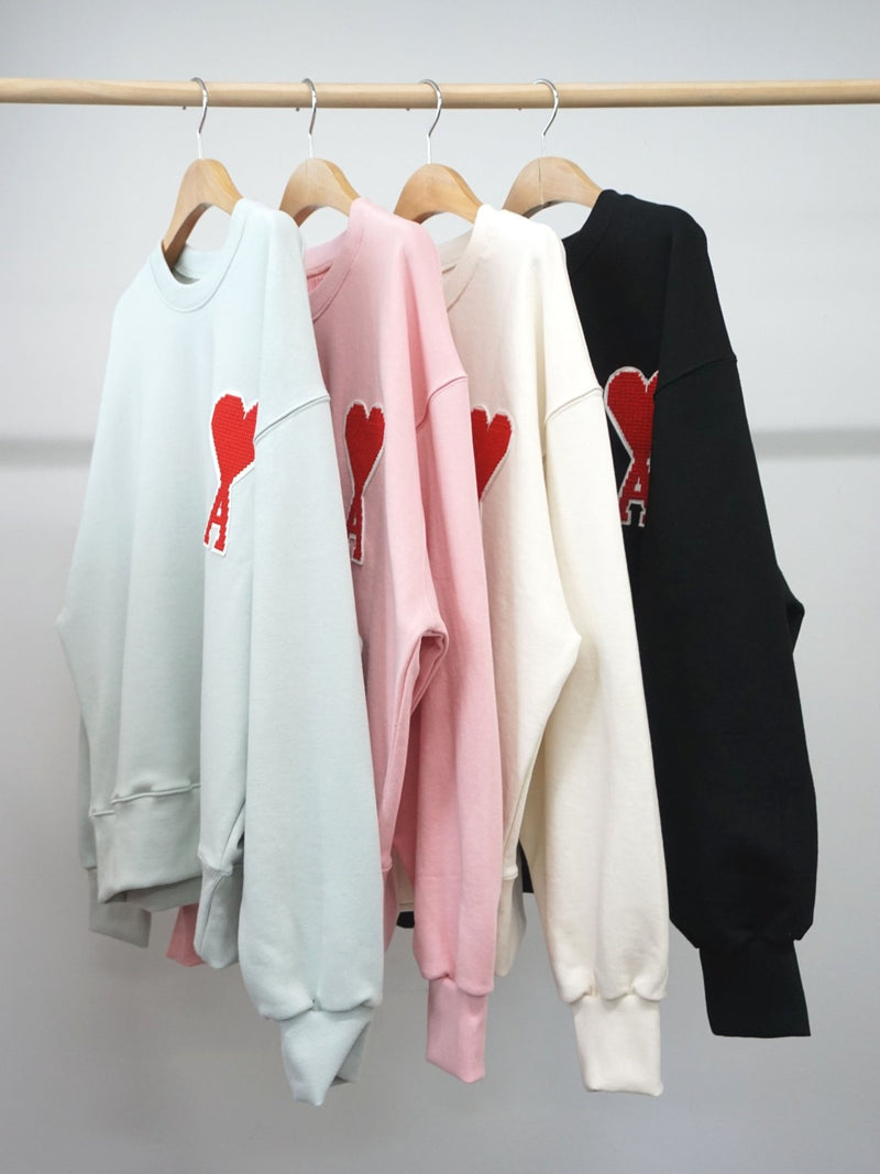 A HEART SWEATSHIRT