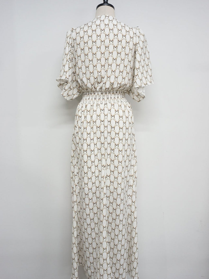 ANGLED HEM PRINT DRESS WITH CONTRAST DETAIL