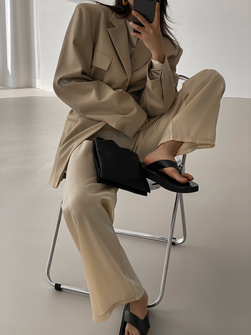 BELTED BUTTON DOWN TAILORED WOOL BLAZER