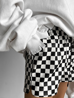 CHECKERBOARD VEGAN LEATHER SHORTS