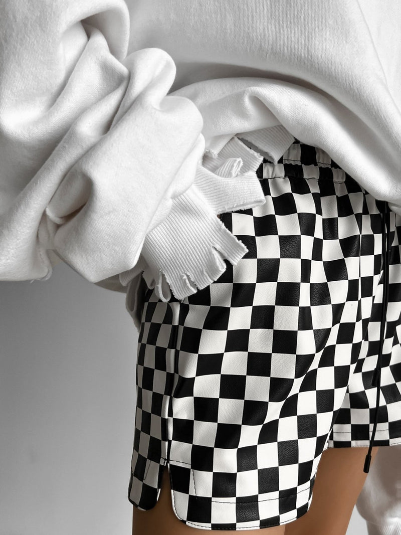 CHECKERBOARD VEGAN LEATHER SHORTS