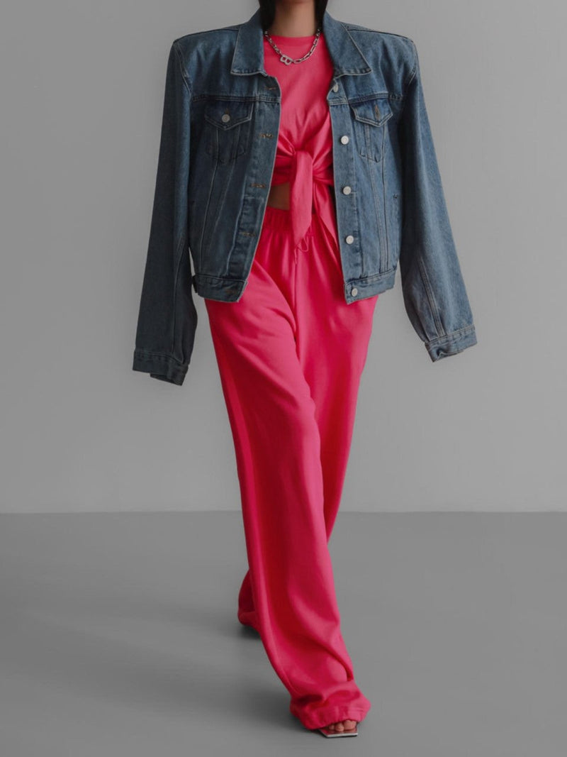 red jumpsuit with denim jacket