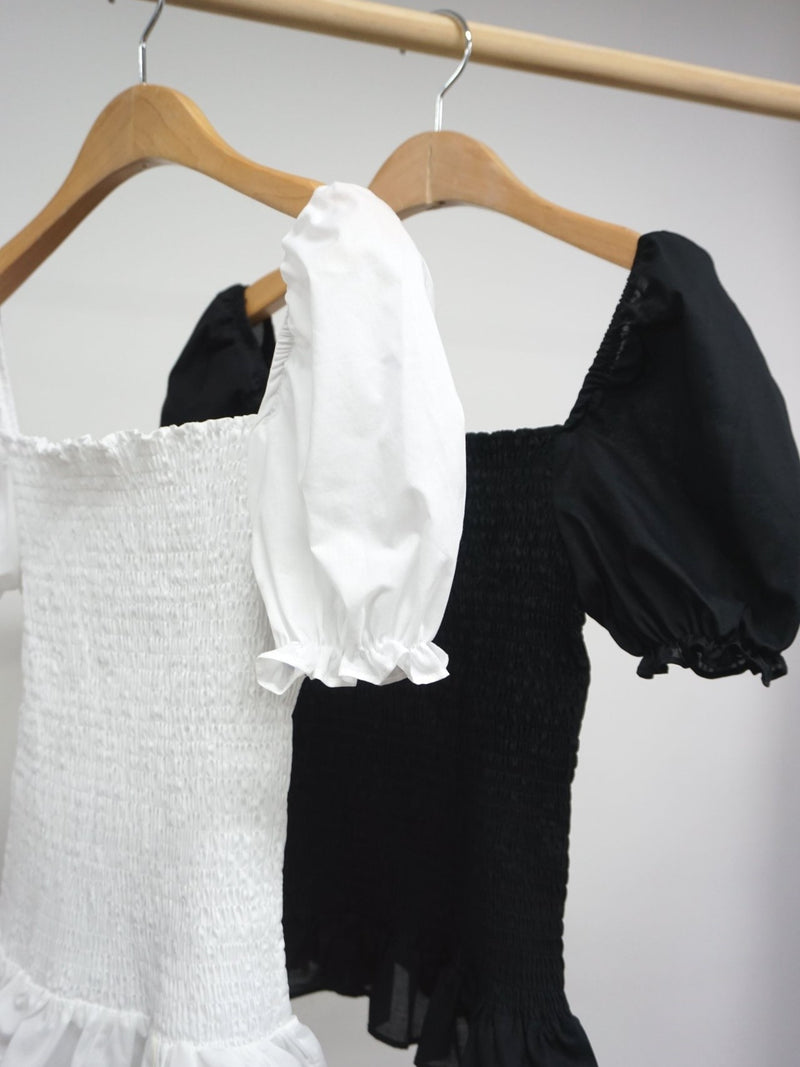 SHIRRED BLOUSE WITH RUFFLE HEM