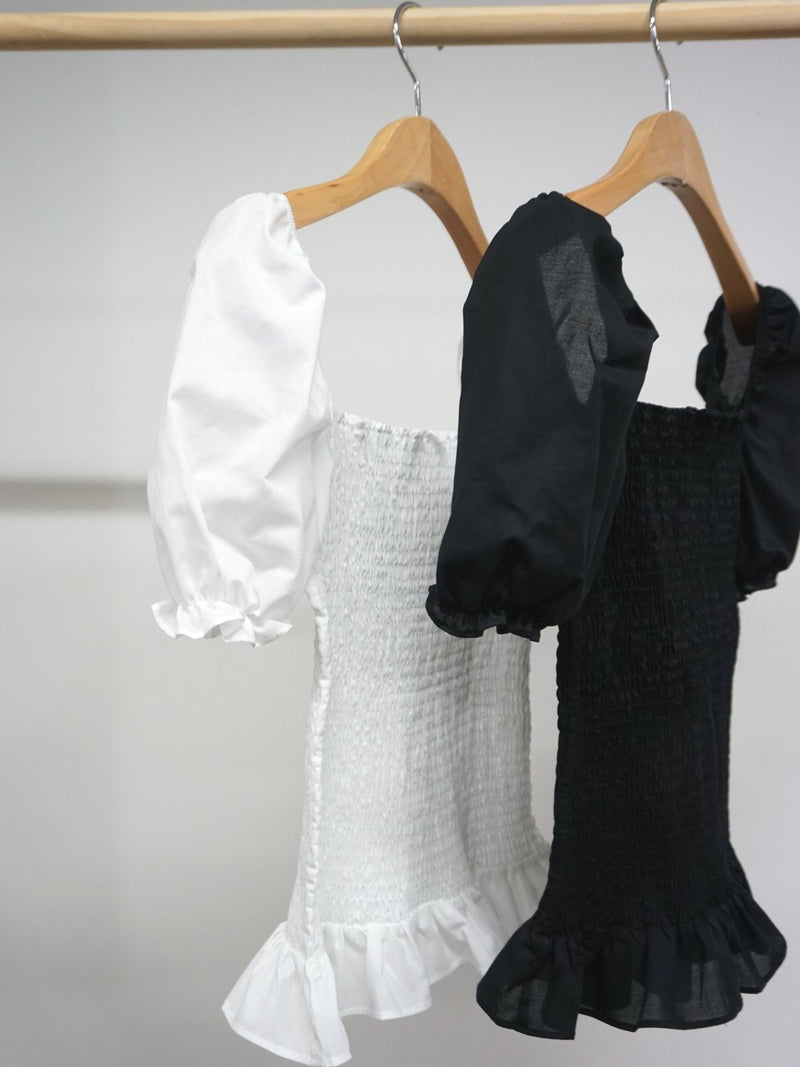 SHIRRED BLOUSE WITH RUFFLE HEM