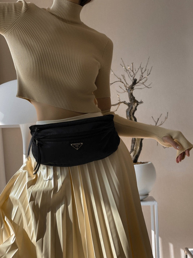 VEGAN LEATHER PLEATED FLARE SKIRT