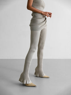 WAVE HEM FLARED RIBBED KNIT PANTS