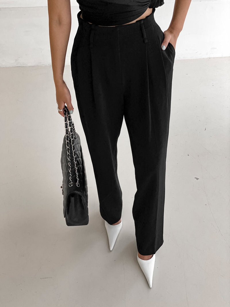 DOUBLE PLEATED STRETCH TROUSERS