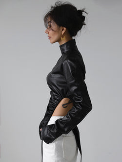 VEGAN LEATHER SIDE SHIRRED HIGH NECK TOP